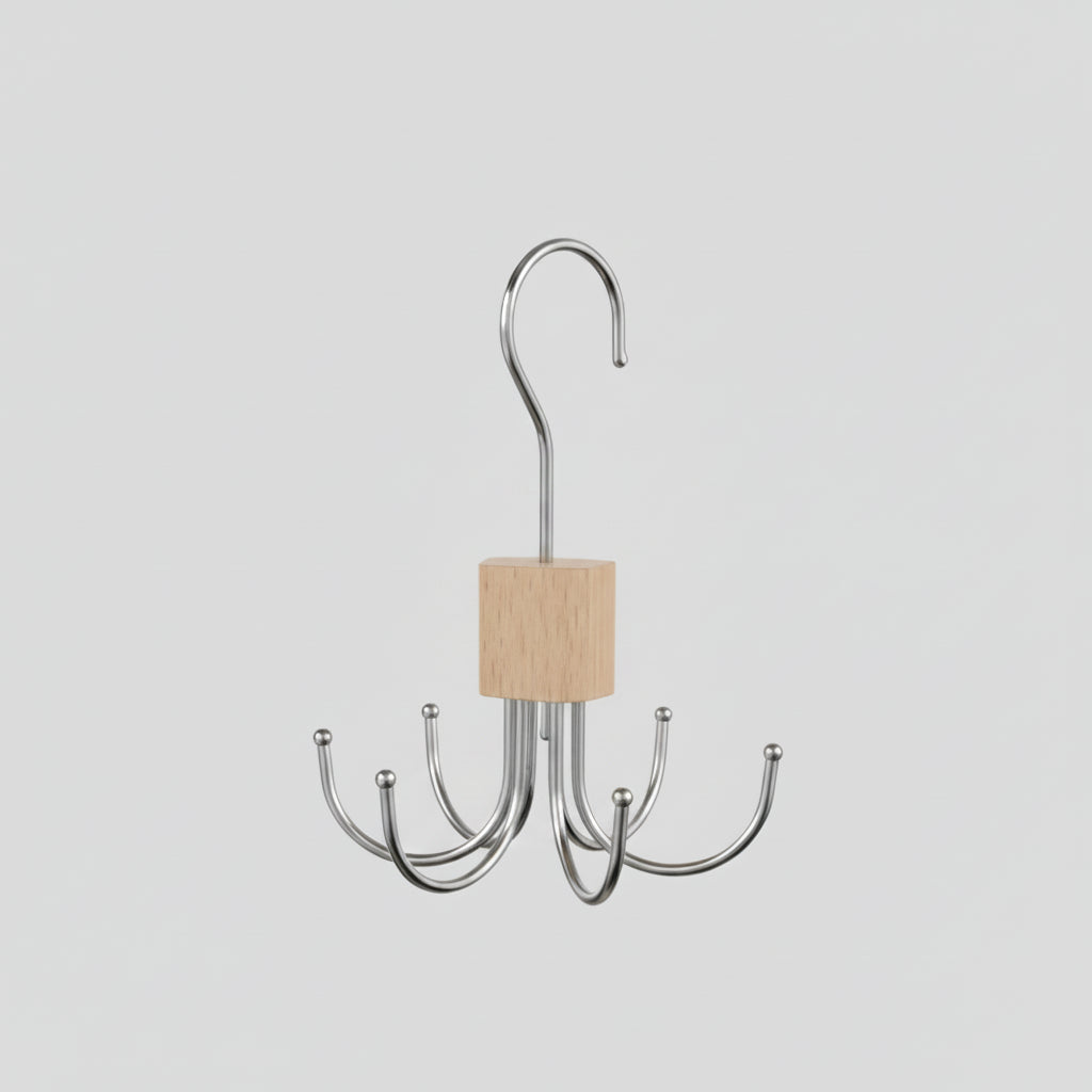 360 rotating storage hanger hook with a hand holding it above a belt